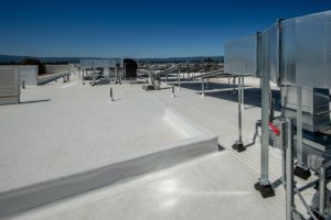 Industrial Roofing Solutions for Harsh Environments: Heat, Chemicals, and Moisture